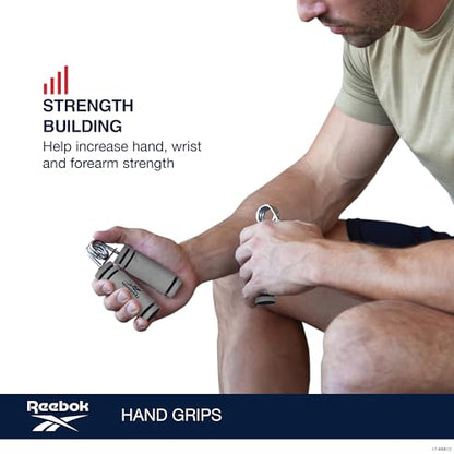 Reebok 2-Pack Hand Grips, Spring Coiled Wrist, Fingers & Forearm Strength Trainer with Soft Foam Handles, Improves Grip Strength, Resistance Hand Gripper for Manual Exercises & Rehab - color: Grey/Black